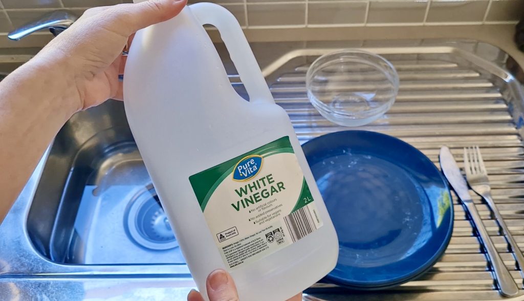 Removing White Dishwasher Residue From Dishes with Vinegar